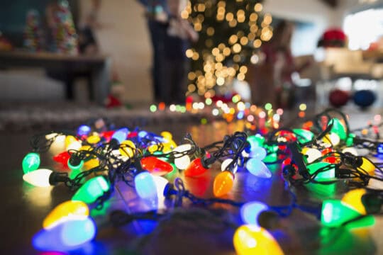 string of colorful Christmas lights on the floor