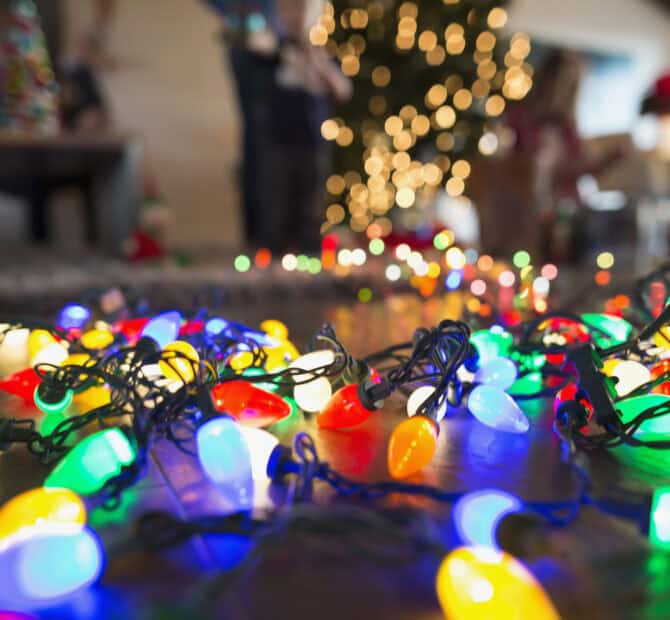 string of colorful Christmas lights on the floor