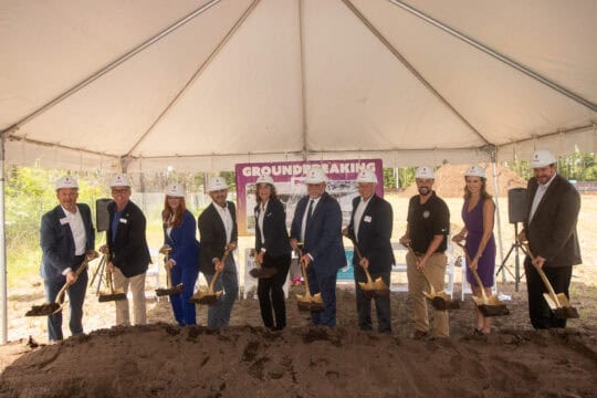PenAir leadership team holds shovel in groundbreaking ceremony