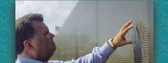 NOW Team Jack admires a memorial wall of names