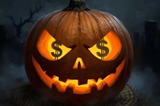 Pumpkin with dollar signs for eyes
