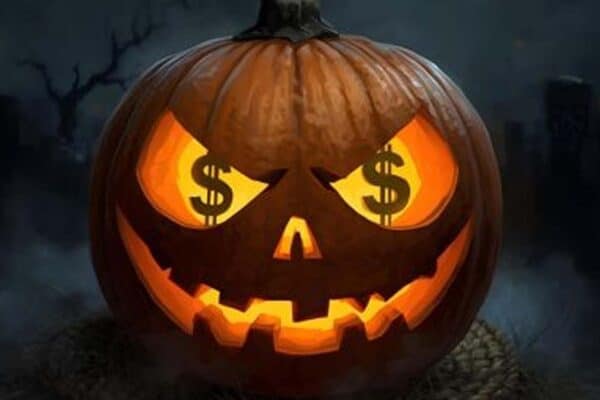 Pumpkin with dollar signs for eyes