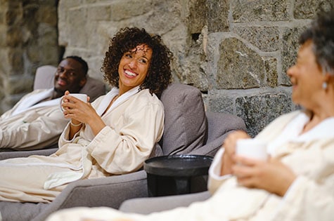 group relaxing in the day spa at a luxury resort hotel.